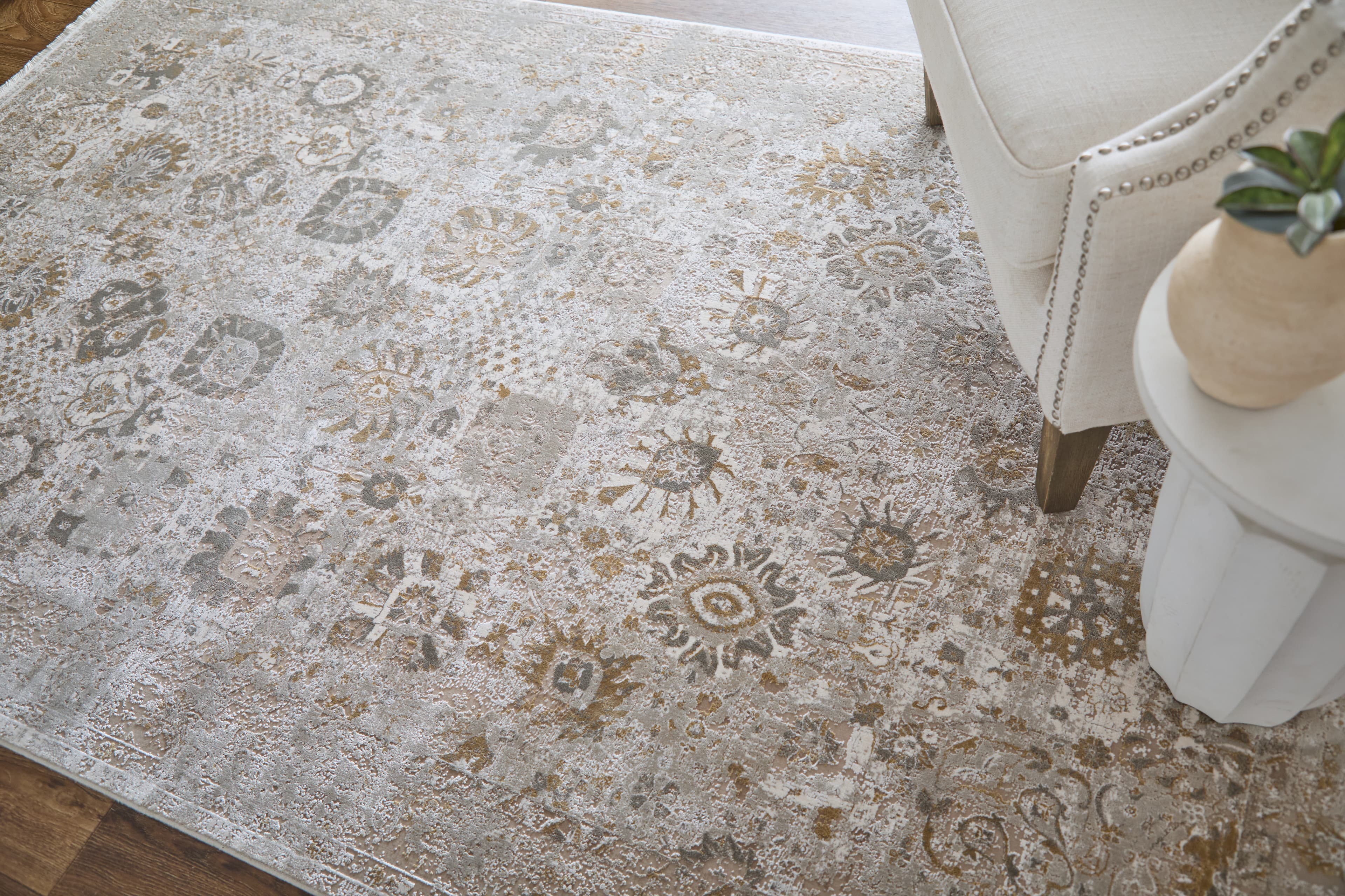Cadiz Ivory/Gray/Gold rug styled in a room
