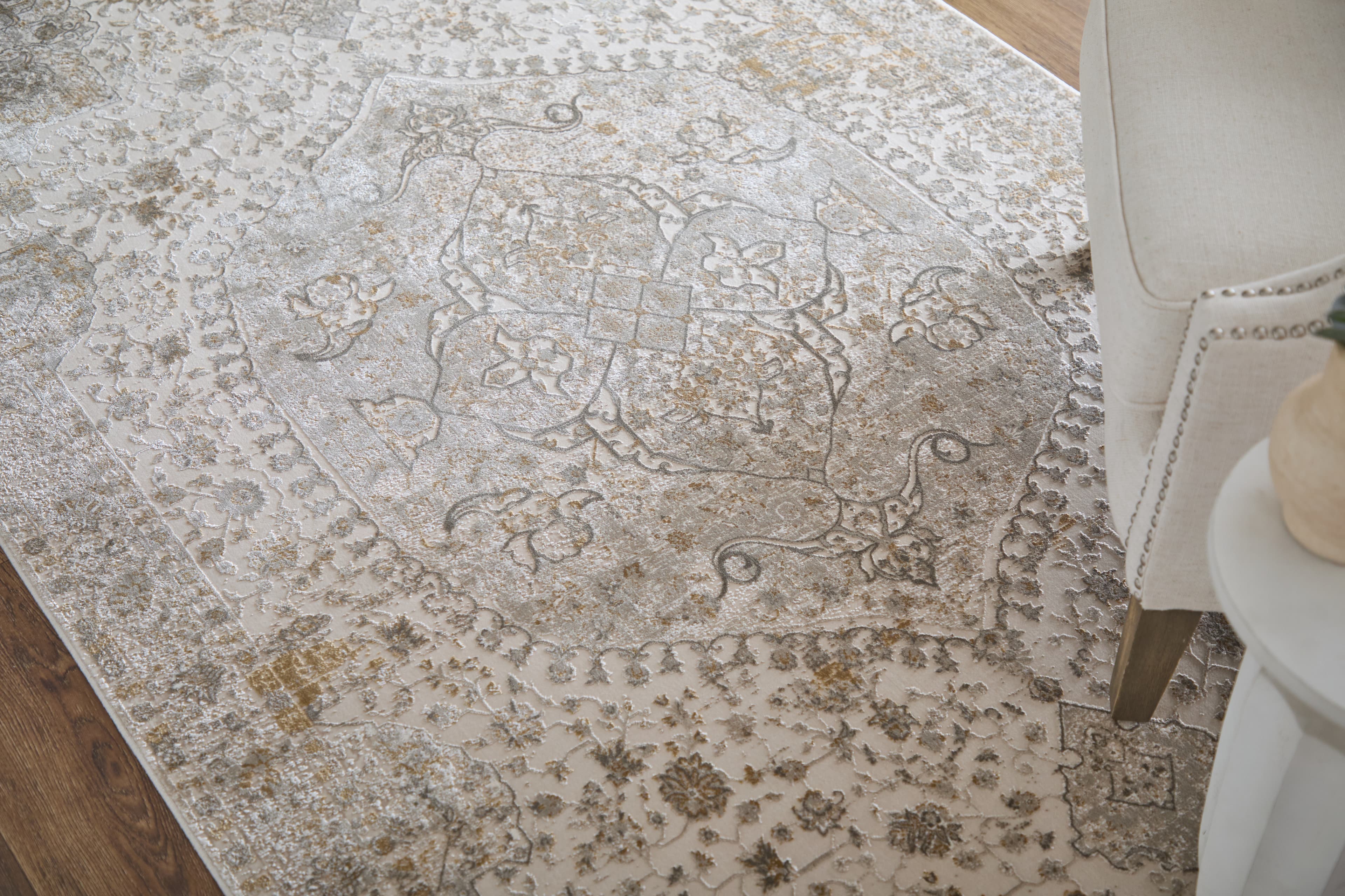 Cadiz Ivory/Gray/Gold rug styled in a room