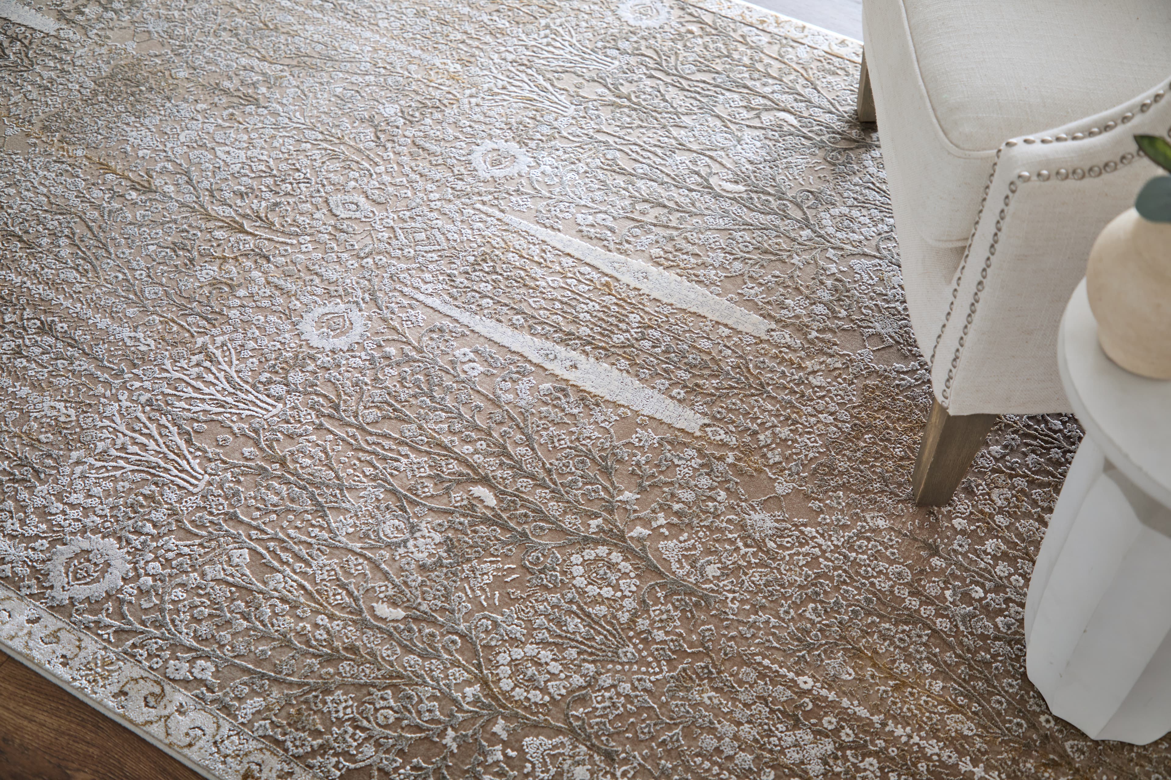 Cadiz Ivory/Taupe/Gold rug styled in a room