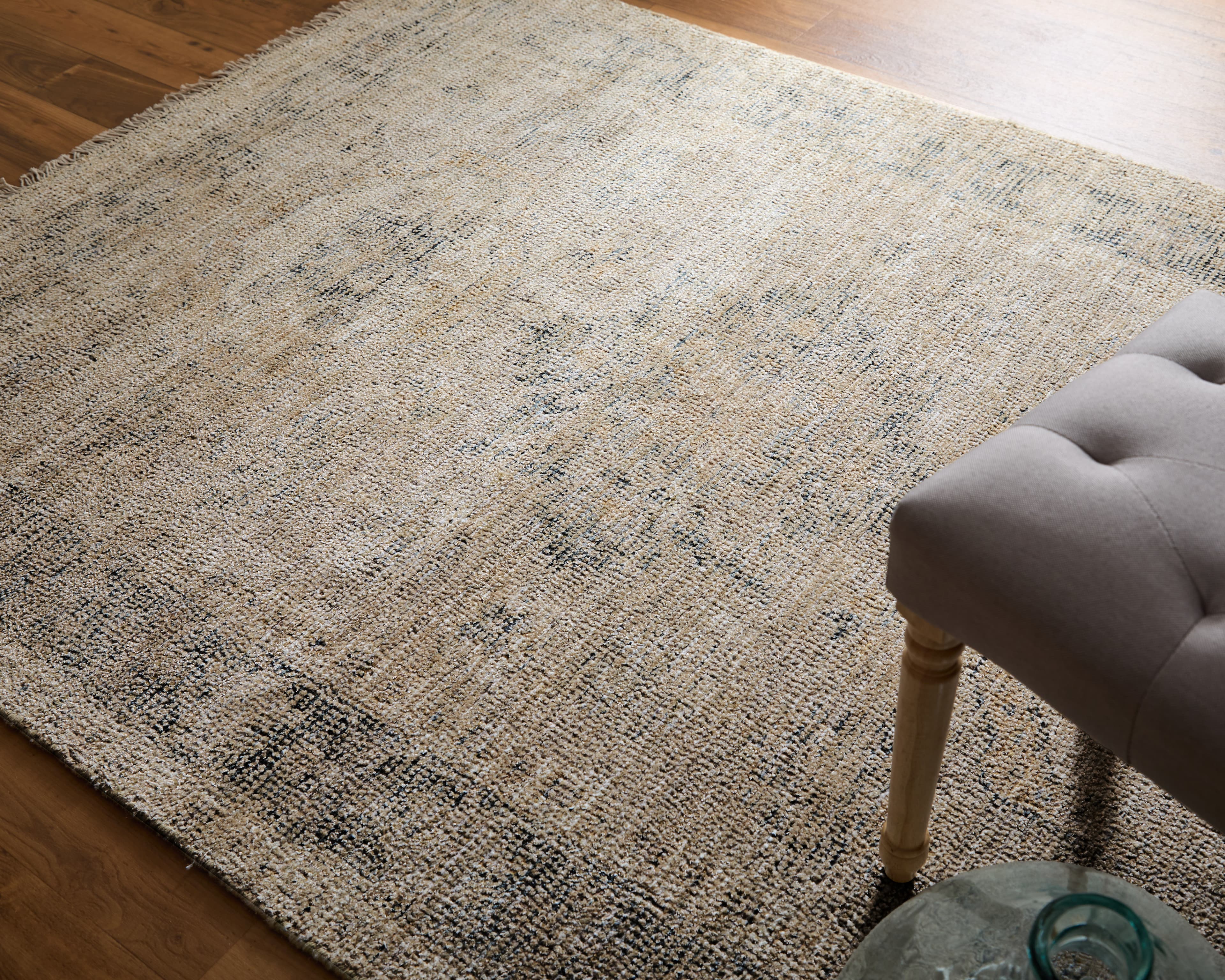 Caldwell Tan/Gray/Gold rug styled in a room