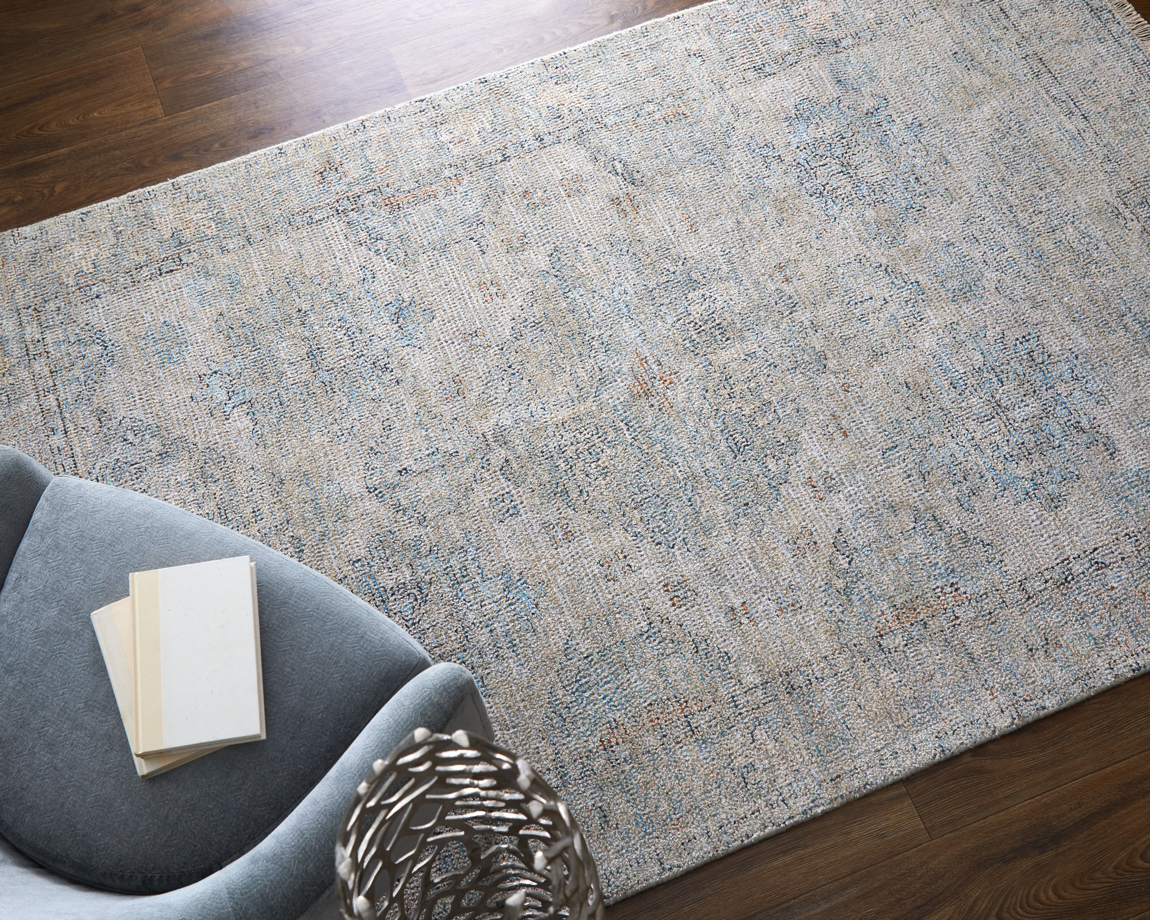 Caldwell Blue/Gray/Taupe rug styled in a room