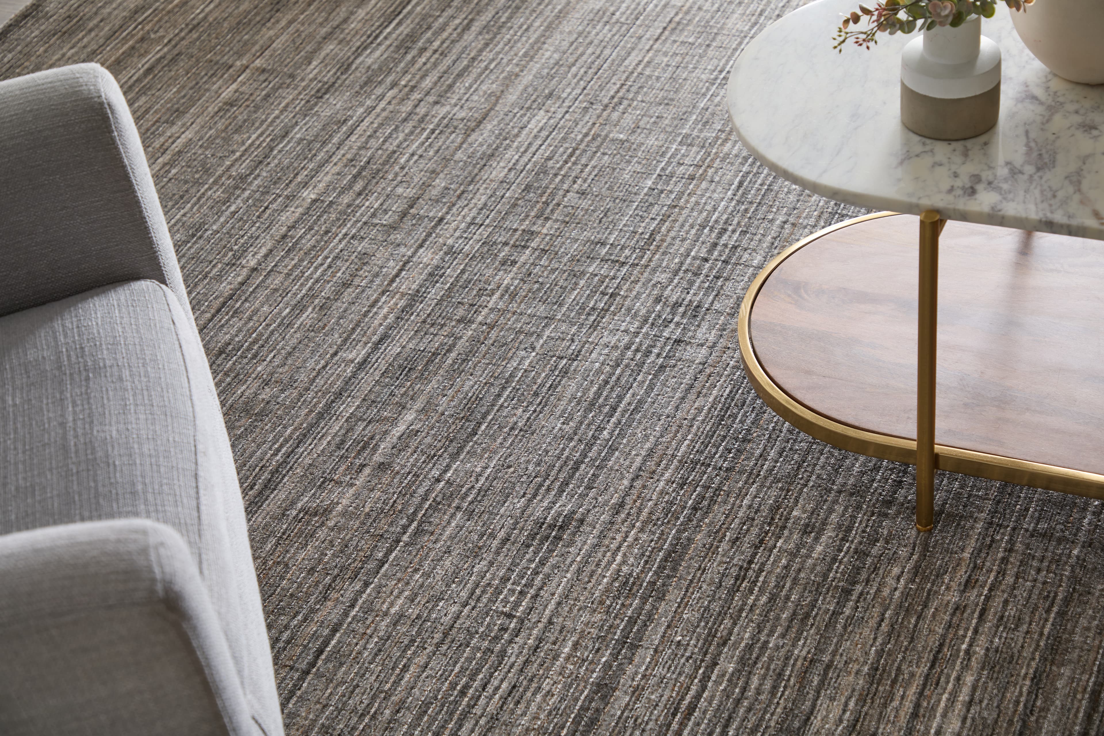 Contemporary Black/Gray/Brown rug styled in a room