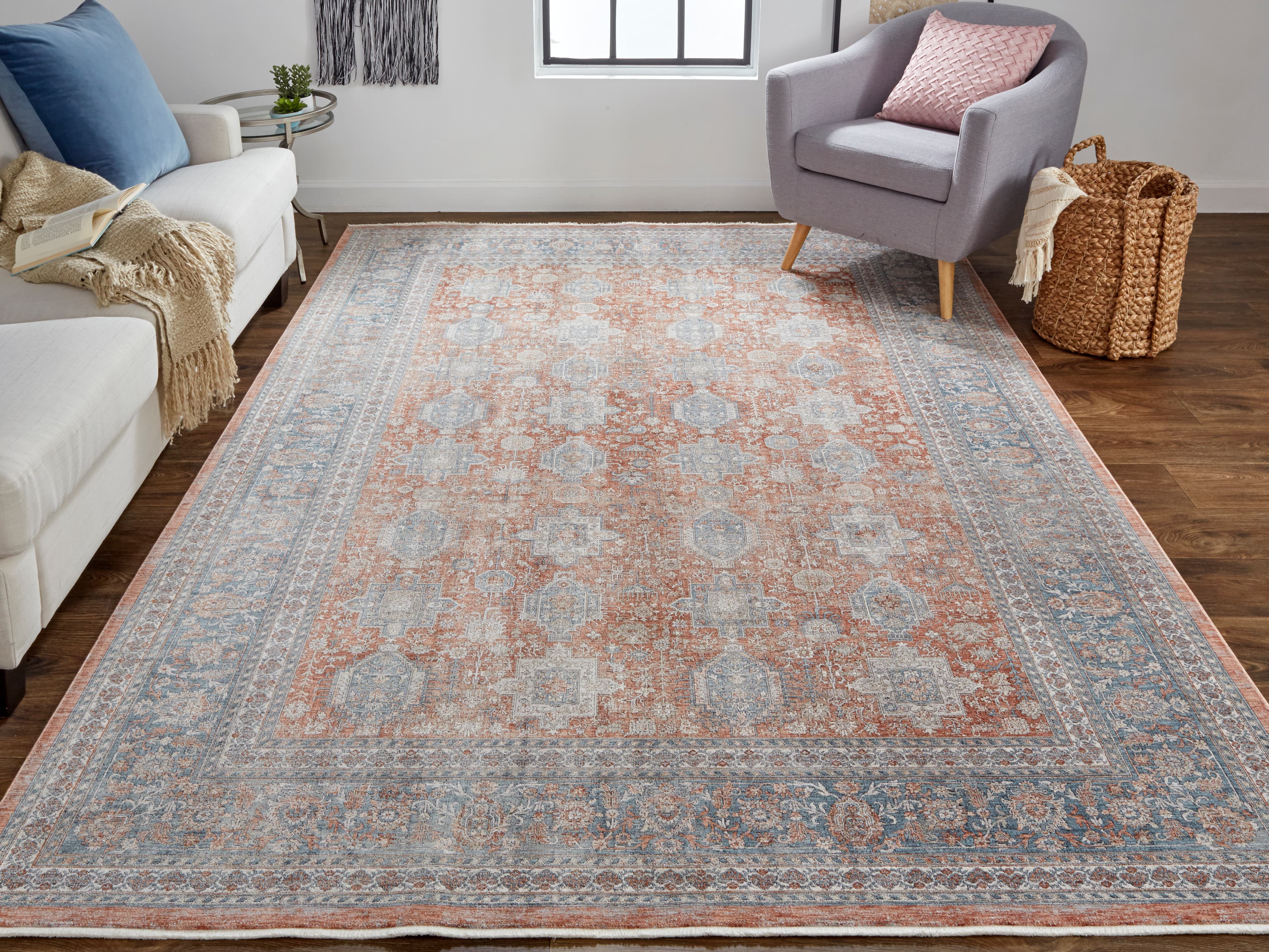 Marquette Red/Orange/Blue rug styled in a room