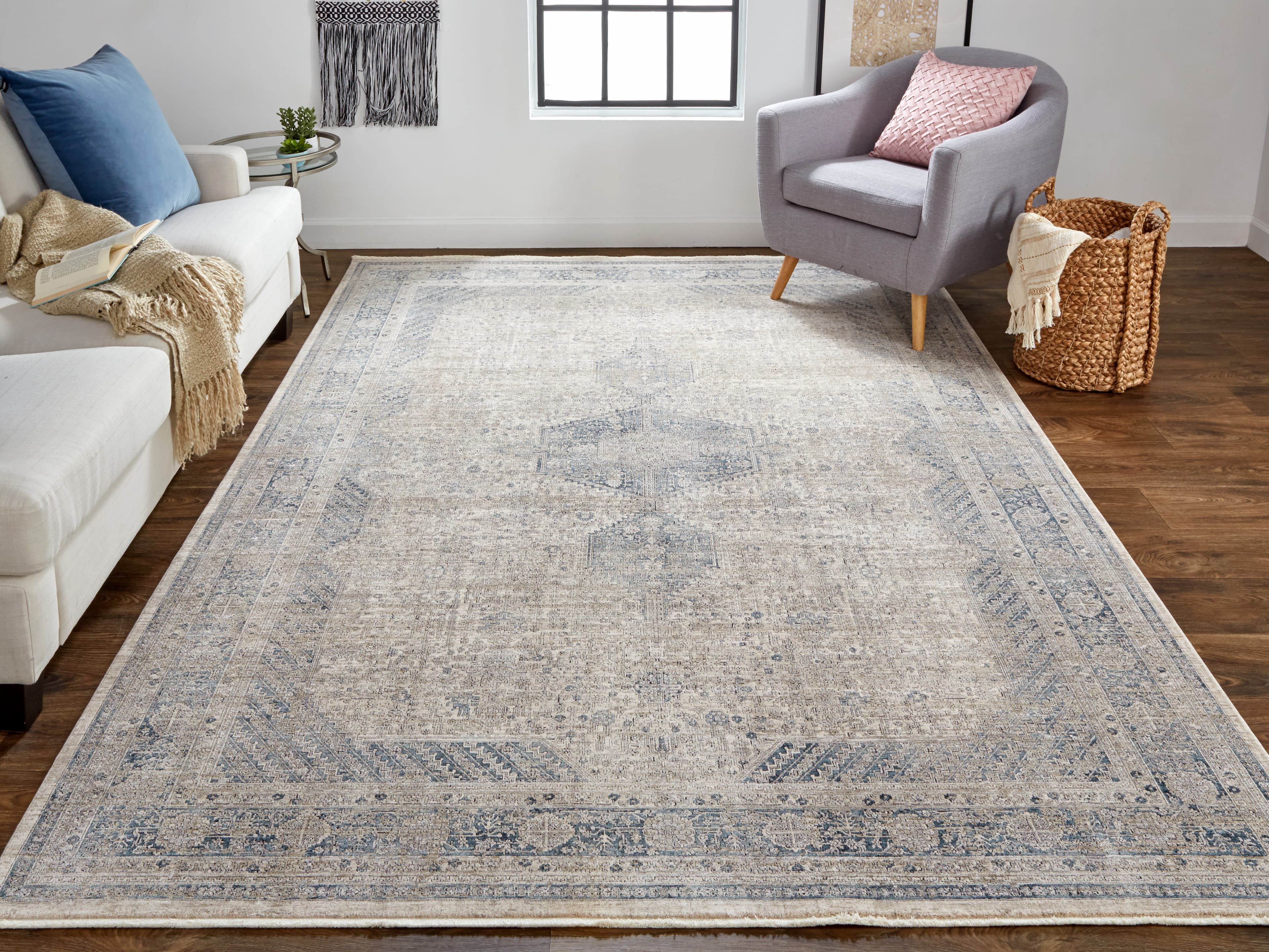 Marquette Taupe/Gray/Blue rug styled in a room